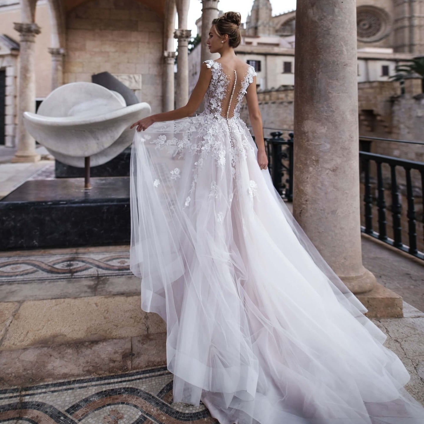 Beach-ready wedding gown with flowy tulle skirt and lace bodice