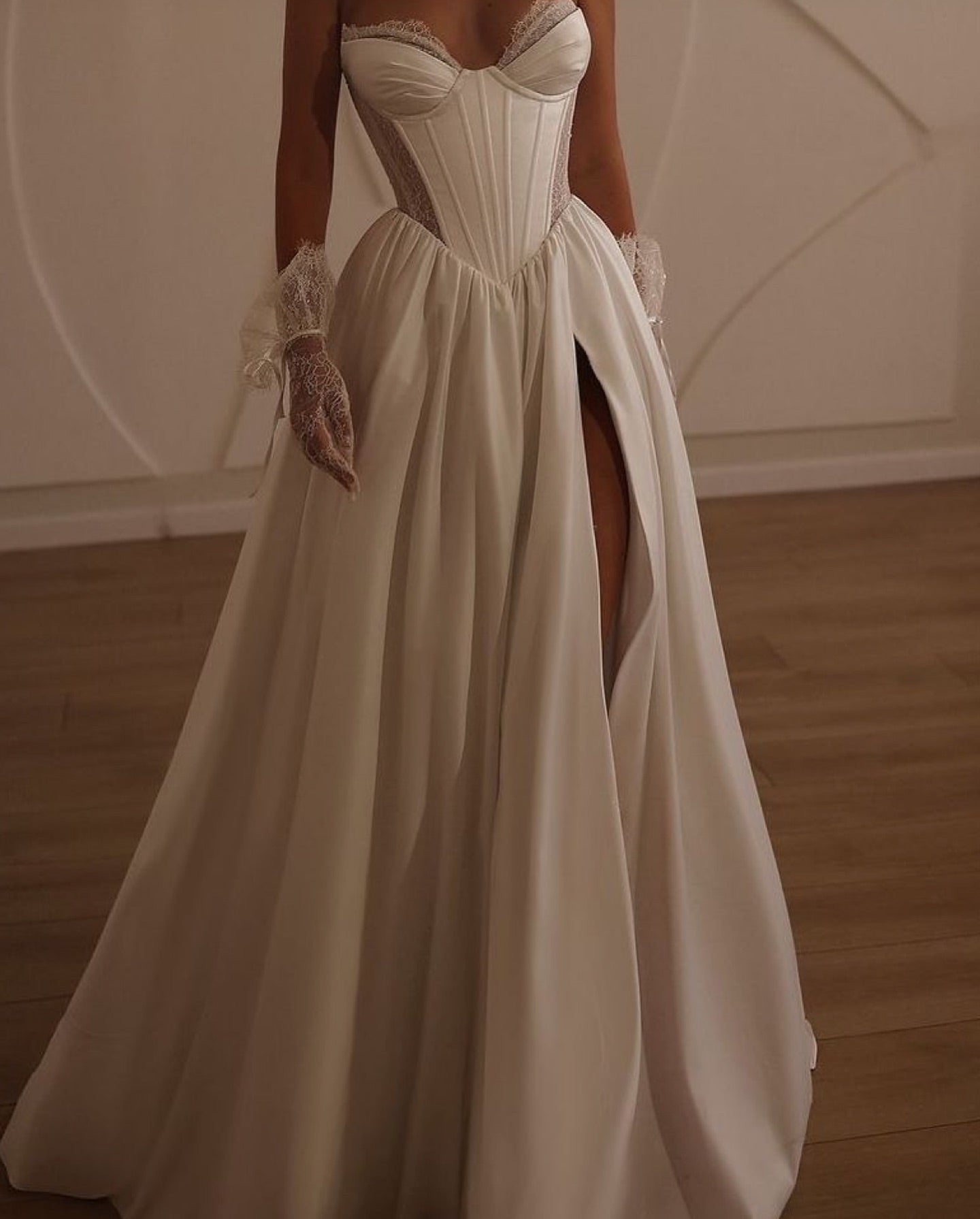 Boho princess wedding gown with high slit and sculpted lace bodice