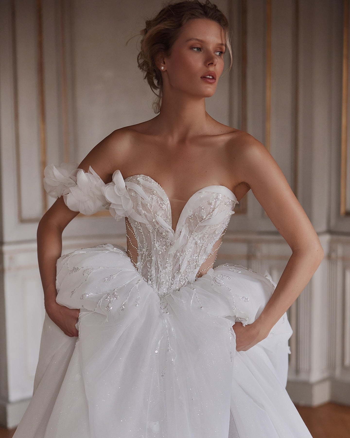Luxury boho wedding dress featuring detachable off-shoulder sleeves and sequins