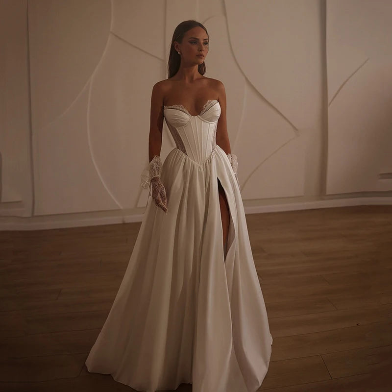 A-line wedding dress with sweetheart neckline and sheer lace corset for romantic brides