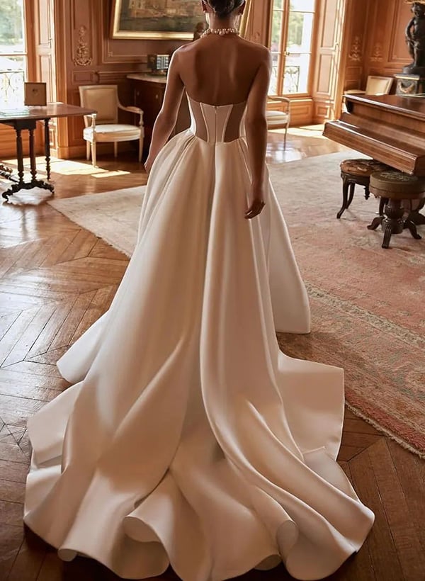 Satin wedding gown with removable long sleeves and structured fit