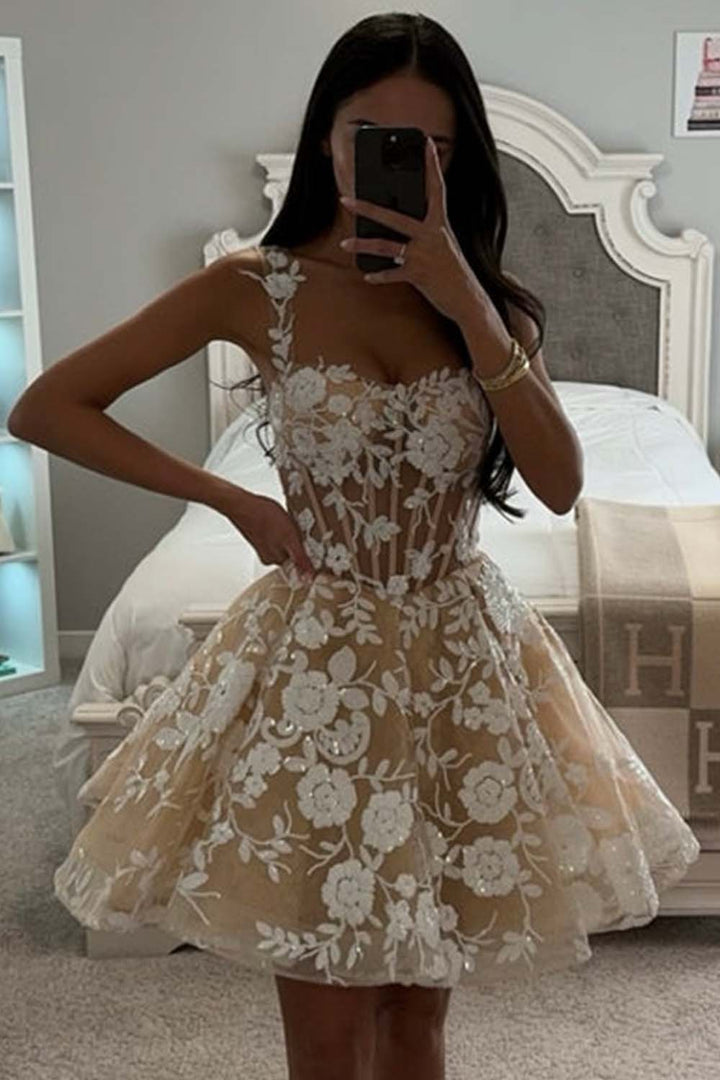 Mini A-line tulle bridal gown in nude champagne with elegant floral embroidery