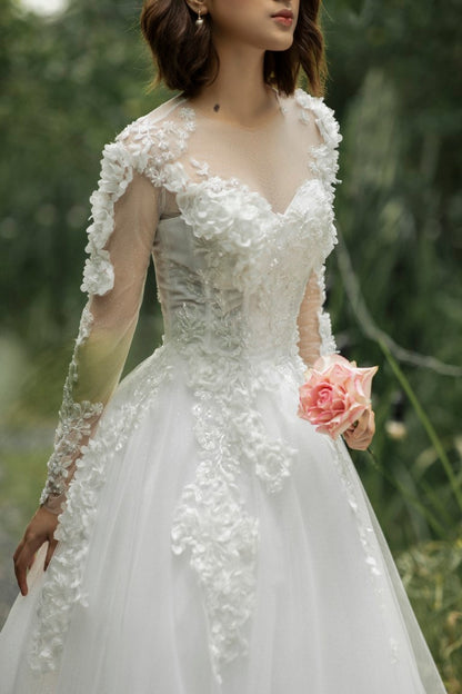 Eirian - "Opulent Splendor: Luxurious Floral Lace A-Line Corset Wedding Dress with Long Sleeves and Sparkling Embellishments"
