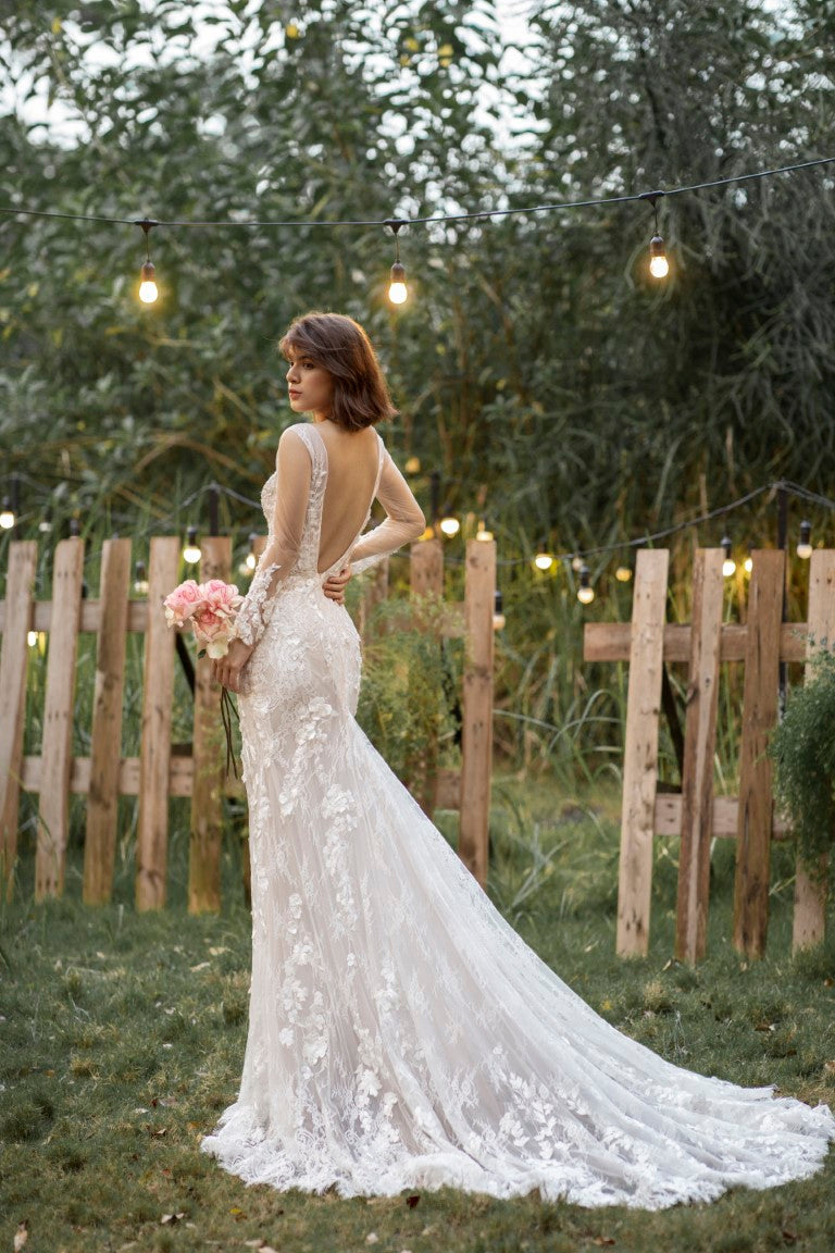 Elegant Long Sleeve Mermaid Wedding Gown: Horizontal Neckline and Glittering Floral Lace - Unveil Your Beauty