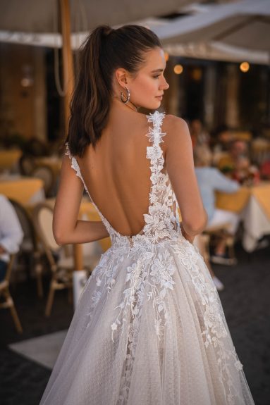 Youthful A-Line Wedding Dress Featuring Deep V-Neck with Straps and Flared Train with High Slit in Premium Off-White Lace