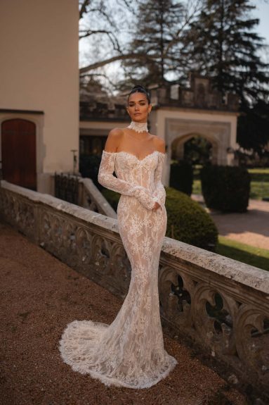 Handmade Stylish Mermaid Bridal Gown With Off-Shoulder Neckline, Long Sleeves, Long Train, And Open Back In Soft Ivory Floral Lace (Copy)