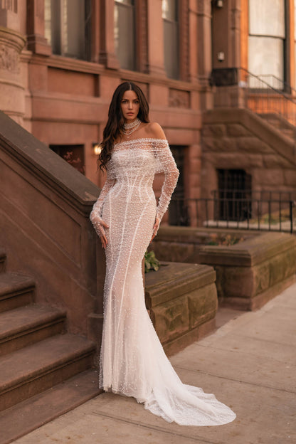 Fashion-Forward Custom Mermaid Wedding Dress With Off-Shoulder Long Sleeves, Beaded Tulle Train, And Luxe Lining