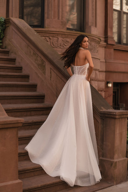 Fashion-Forward Custom Mermaid Wedding Dress With Off-Shoulder Long Sleeves, Beaded Tulle Train, And Luxe Lining