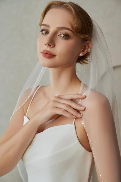 Elegant Fingertip-Length Wedding Veil with Delicate Beaded Edge