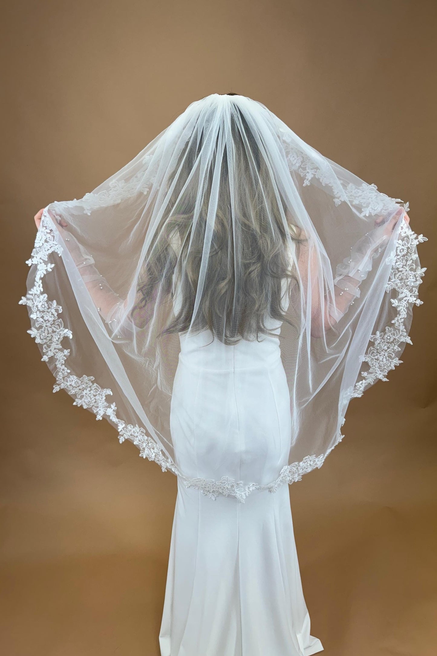 Elegant Fingertip Lace Wedding Veil with Pearls & Embroidered Edging