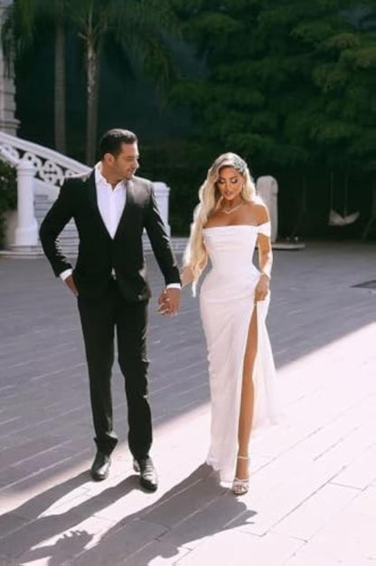 Modern mermaid wedding dress with sweep train and fitted shape, ideal for contemporary bridal looks.

