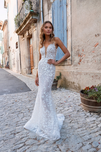 Ethereal Sheer Lace Wedding Dress with Plunging Neckline & Flowing Tulle Train