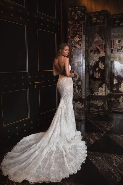 Ethereal Sheer Lace Corset Wedding Dress with Delicate Straps & Flowing Train