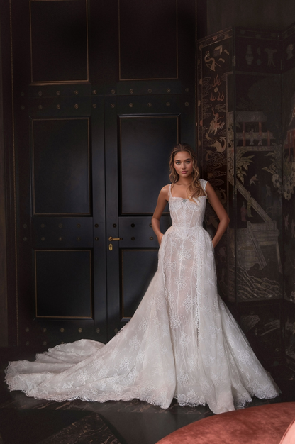 Ethereal Sheer Lace Corset Wedding Dress with Delicate Straps & Flowing Train