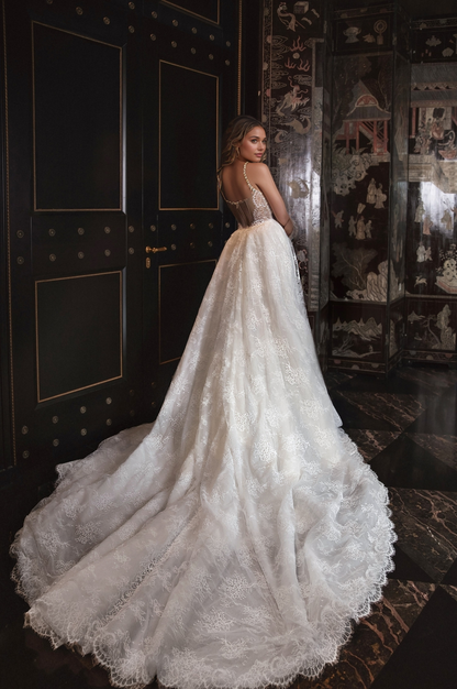 Ethereal Sheer Lace Corset Wedding Dress with Delicate Straps & Flowing Train