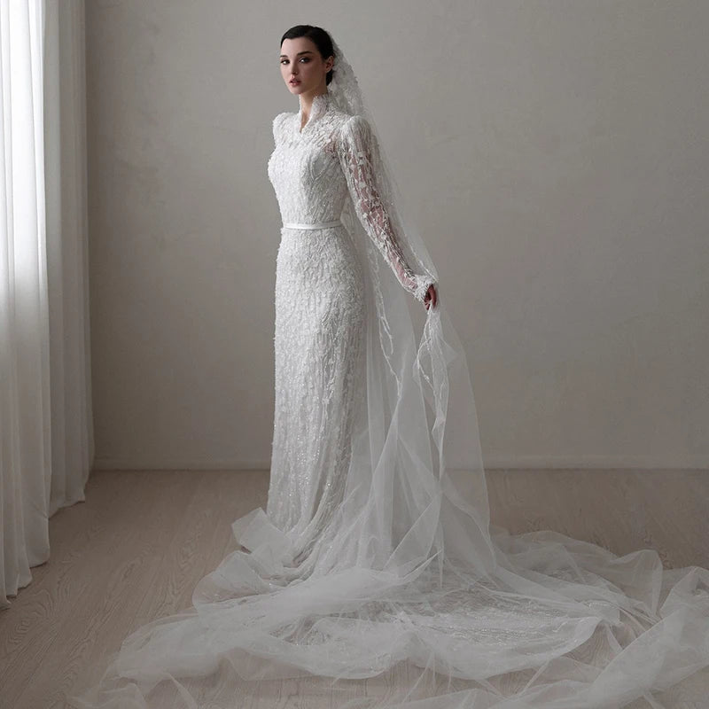 High neck mermaid wedding dress with lace sleeves and classic silhouette 