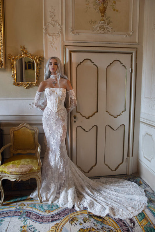 Sexy lace mermaid wedding dress with structured corset, perfect for elegant and bold brides.