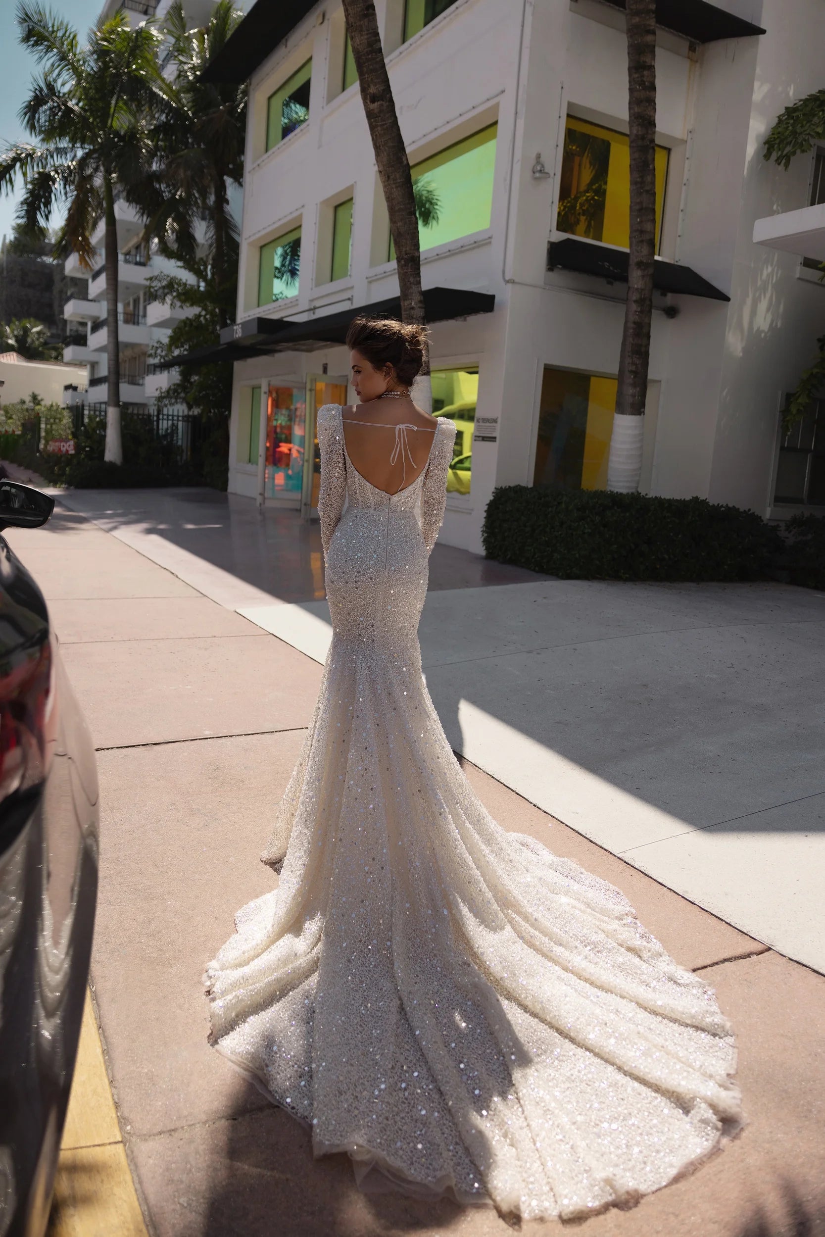 Fashion-forward wedding dress for modern brides wanting iconic glamor and elegance.

