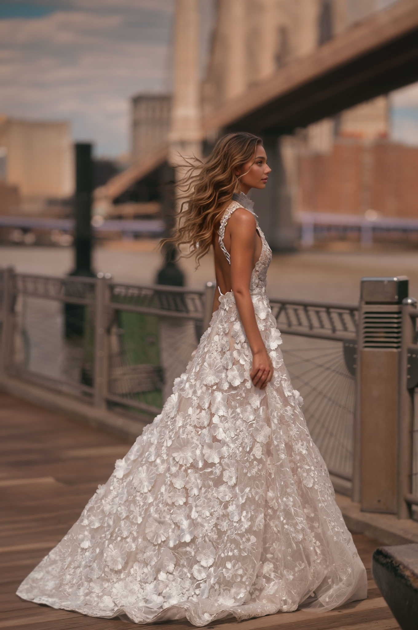 Romantic A-line wedding dress with delicate 3D lace flowers and a high-neck halter design.