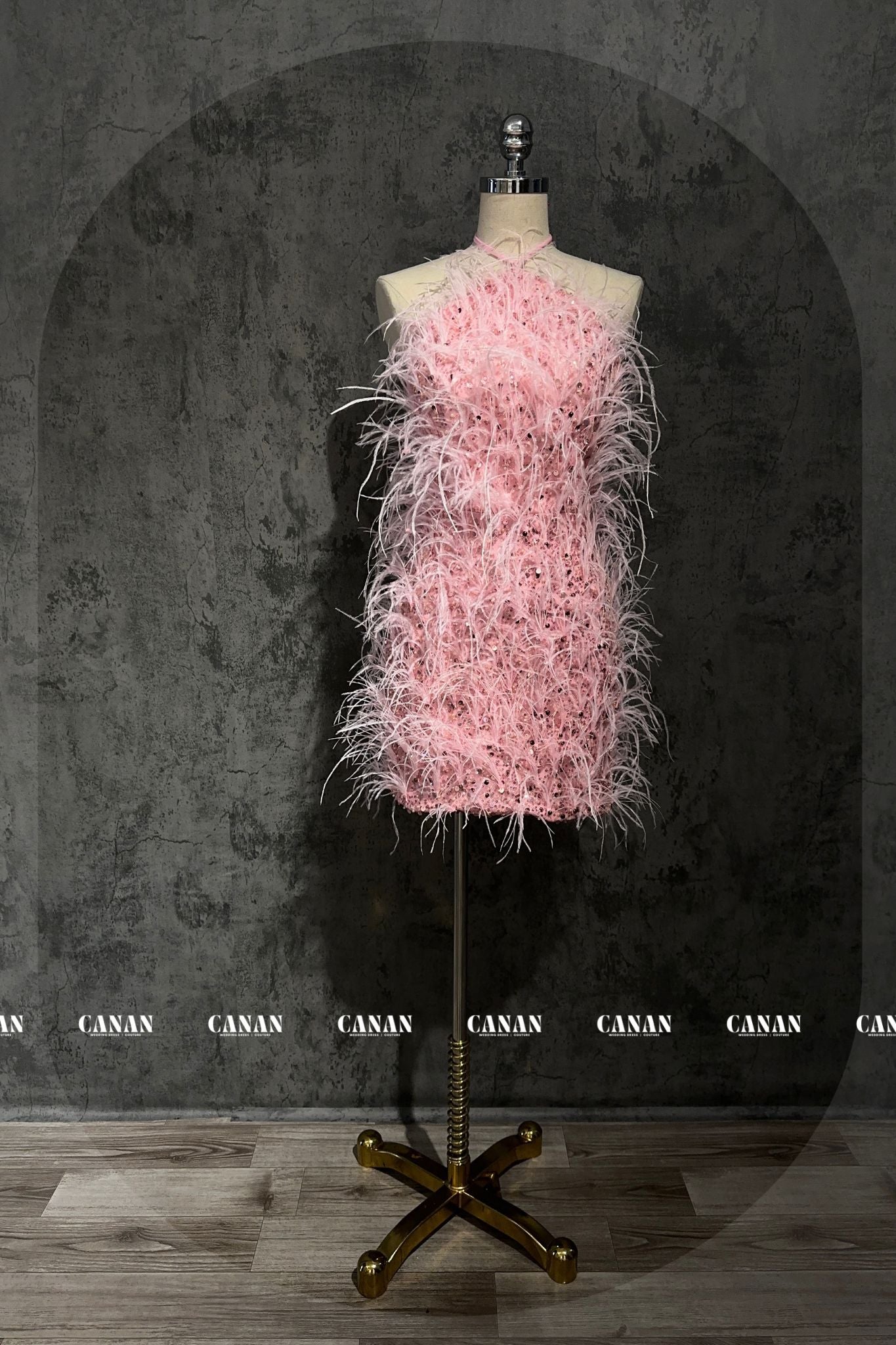 Short Pink Dress with Feather Accents for a Whimsical Touch