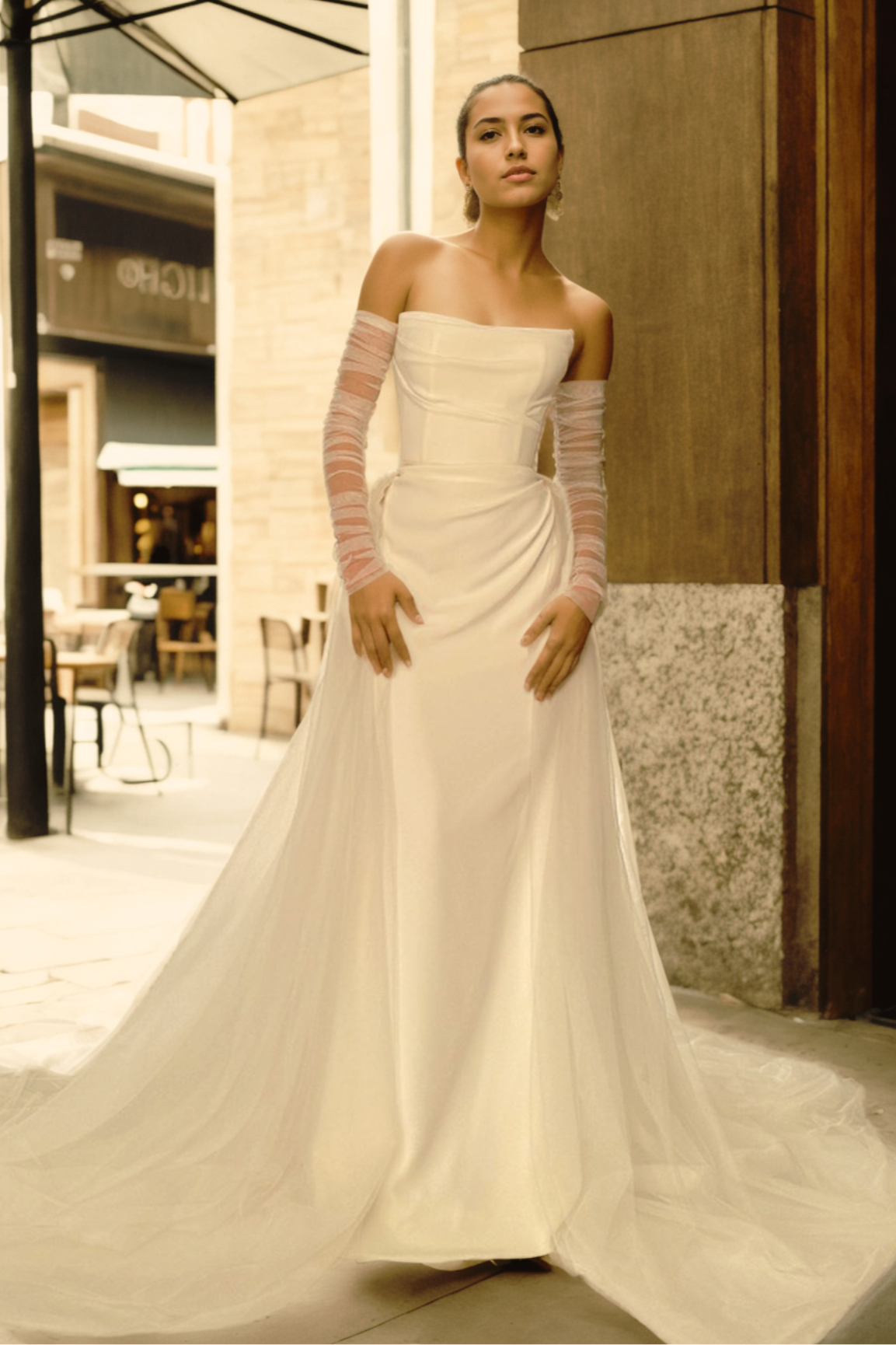 Elegant Mermaid Wedding Dress in Off-White Satin with Straight Neckline, Detachable Puffy Train, and Light Sheer Sleeves