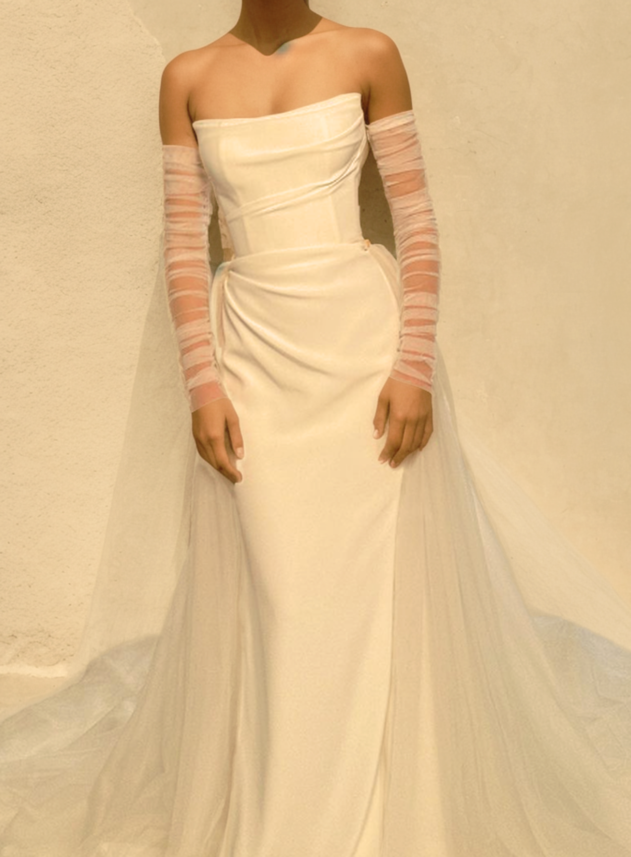 Elegant Mermaid Wedding Dress in Off-White Satin with Straight Neckline, Detachable Puffy Train, and Light Sheer Sleeves