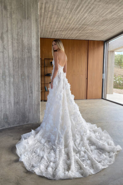 Back view of floral applique wedding dress with long train