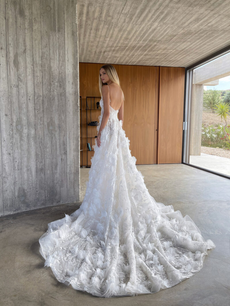 Back view of floral applique wedding dress with long train