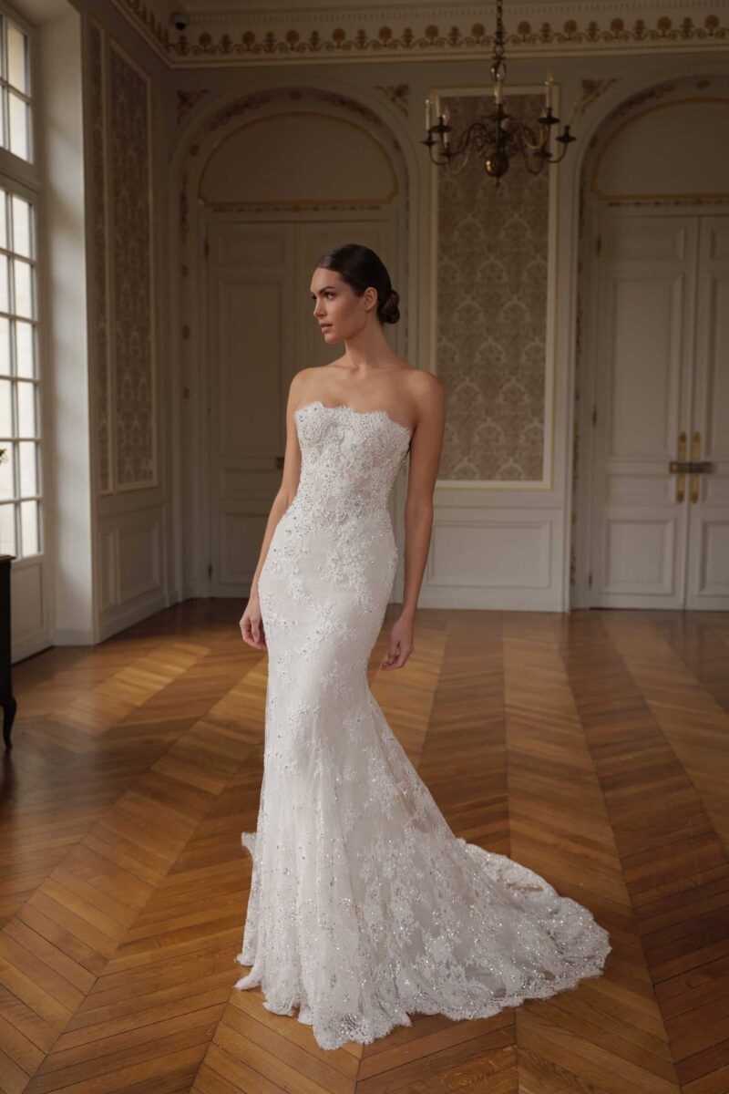 lace mermaid wedding dress with detachable cape and sweetheart neckline