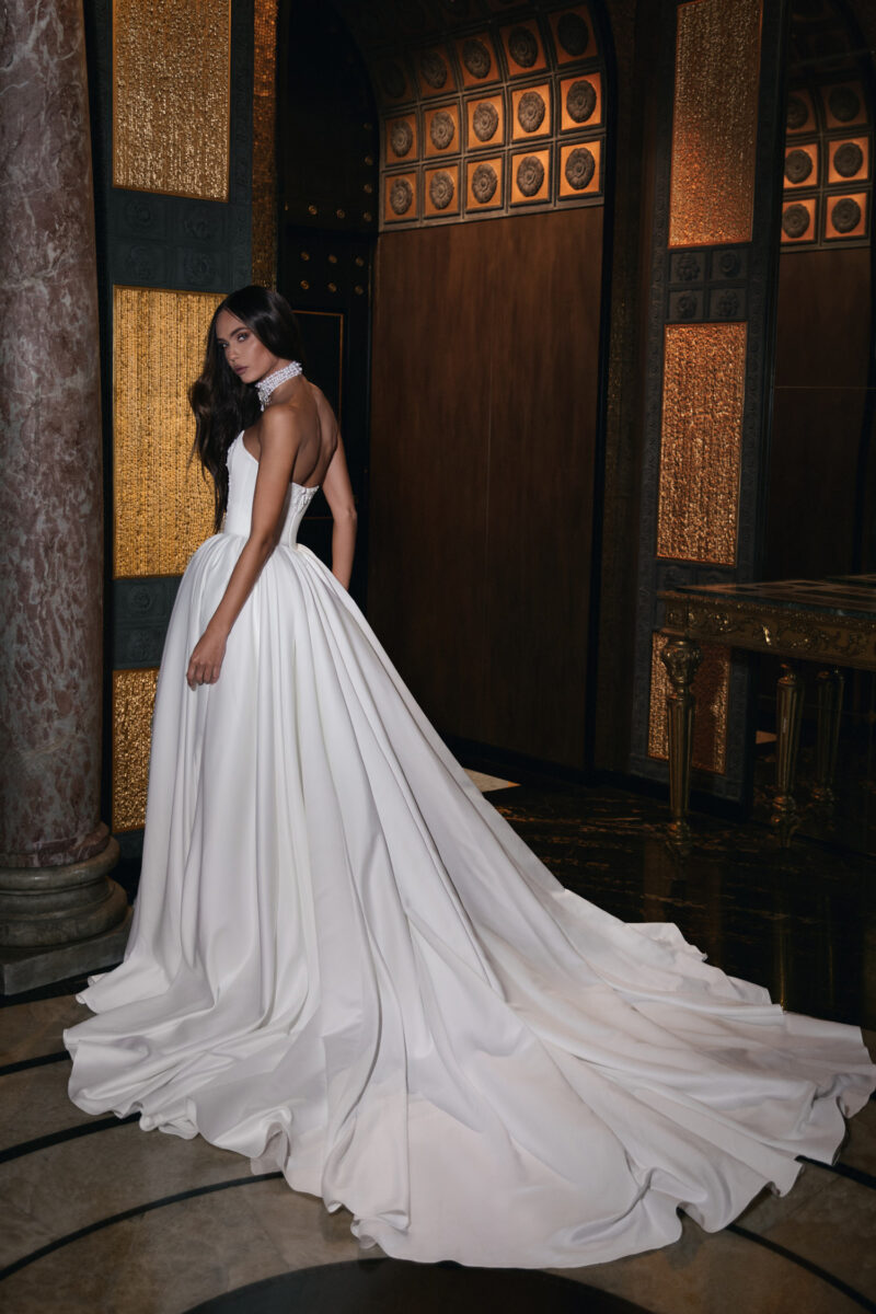 Satin train flowing from corset bridal ball gown