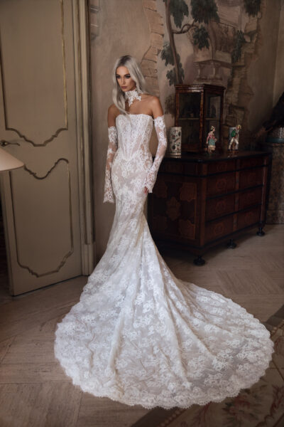 Lace bridal gown with open illusion back and long train