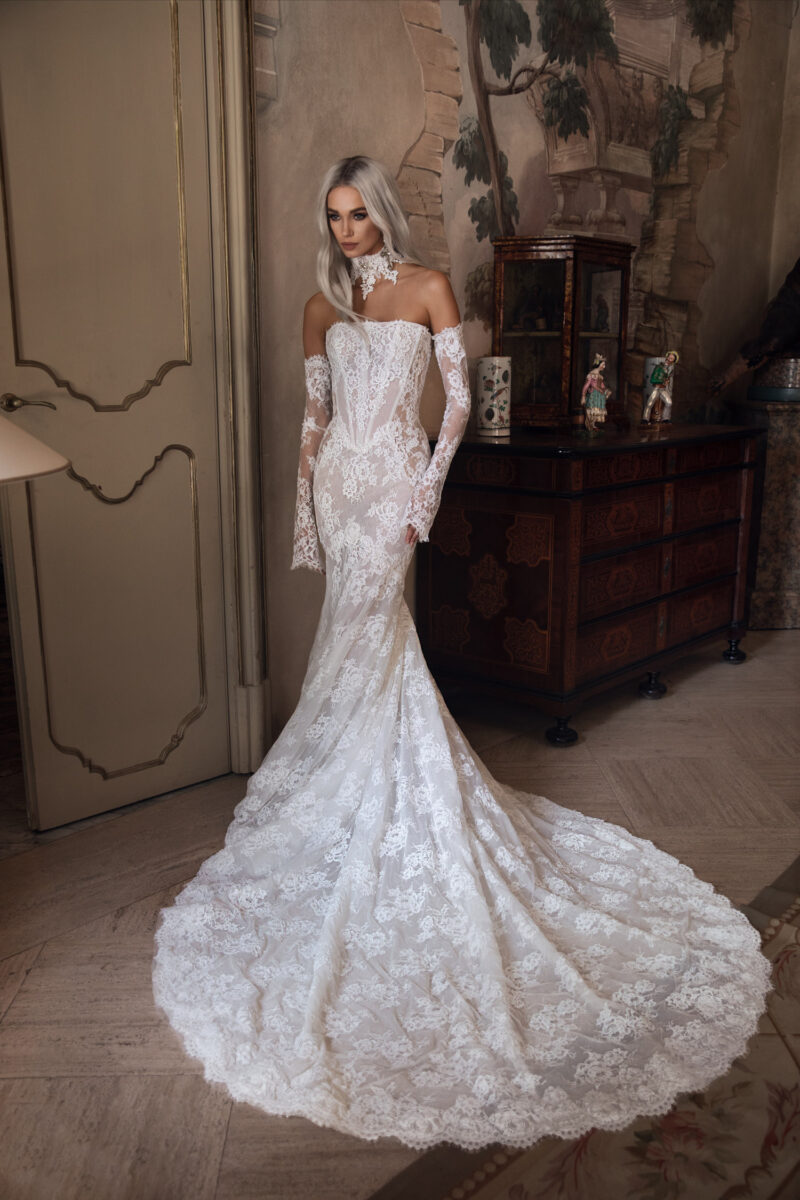Lace bridal gown with open illusion back and long train