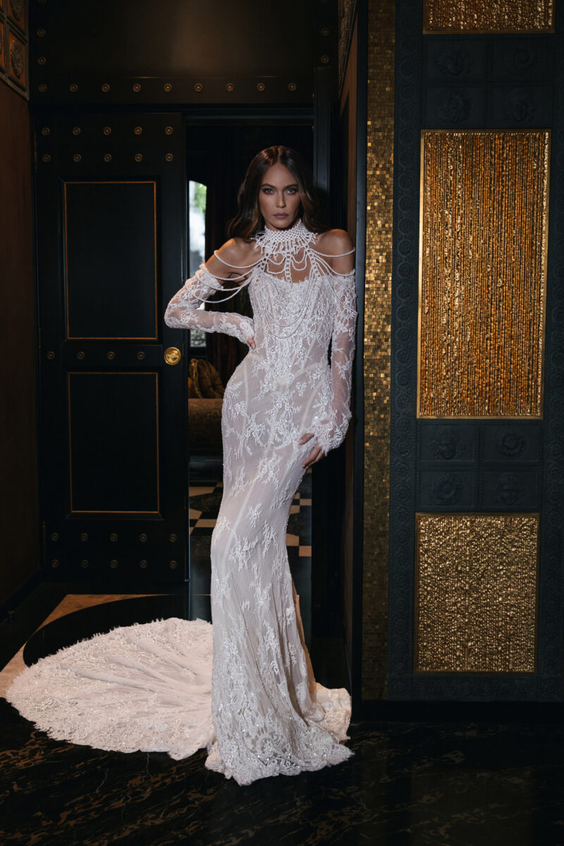 Bride wearing lace mermaid gown with cathedral train