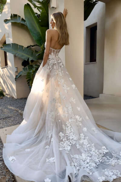 back view of floral tulle wedding gown with long train