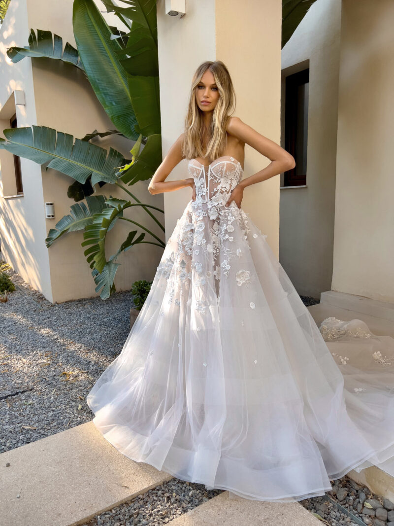 side view of romantic floral wedding dress with tulle layers
