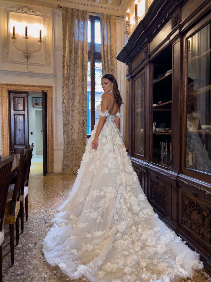 Back of floral tulle wedding dress with train