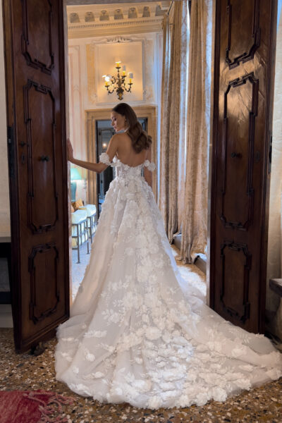 Back of floral tulle wedding dress with train