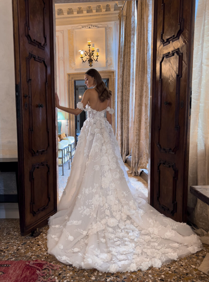 Back of floral tulle wedding dress with train