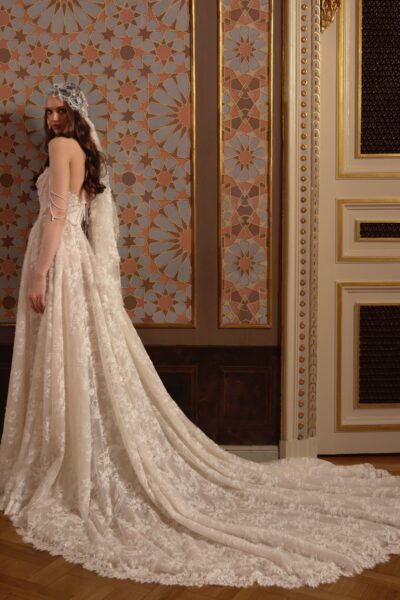 lace A-line wedding dress with sheer corset bodice and pearl straps