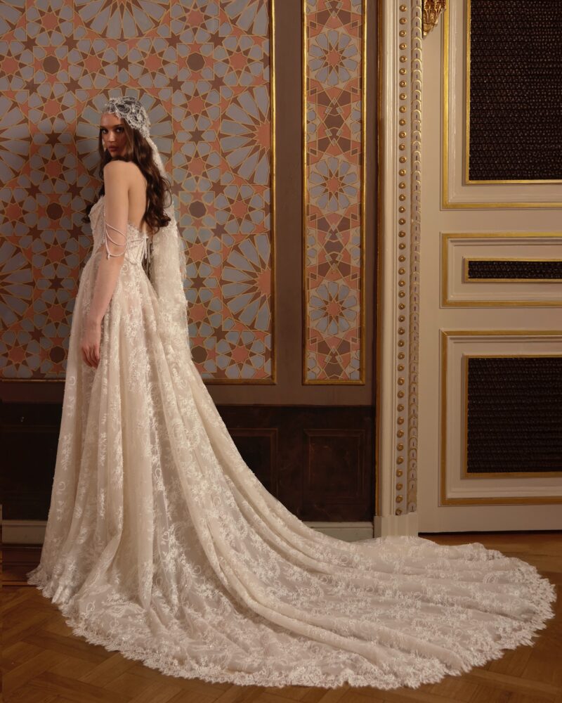 lace A-line wedding dress with sheer corset bodice and pearl straps