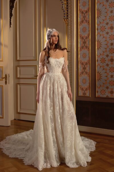 lace A-line wedding dress with pearl straps and cathedral train