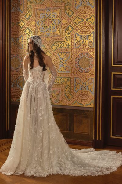 lace ball gown wedding dress with corset bodice and floral lace headpiece