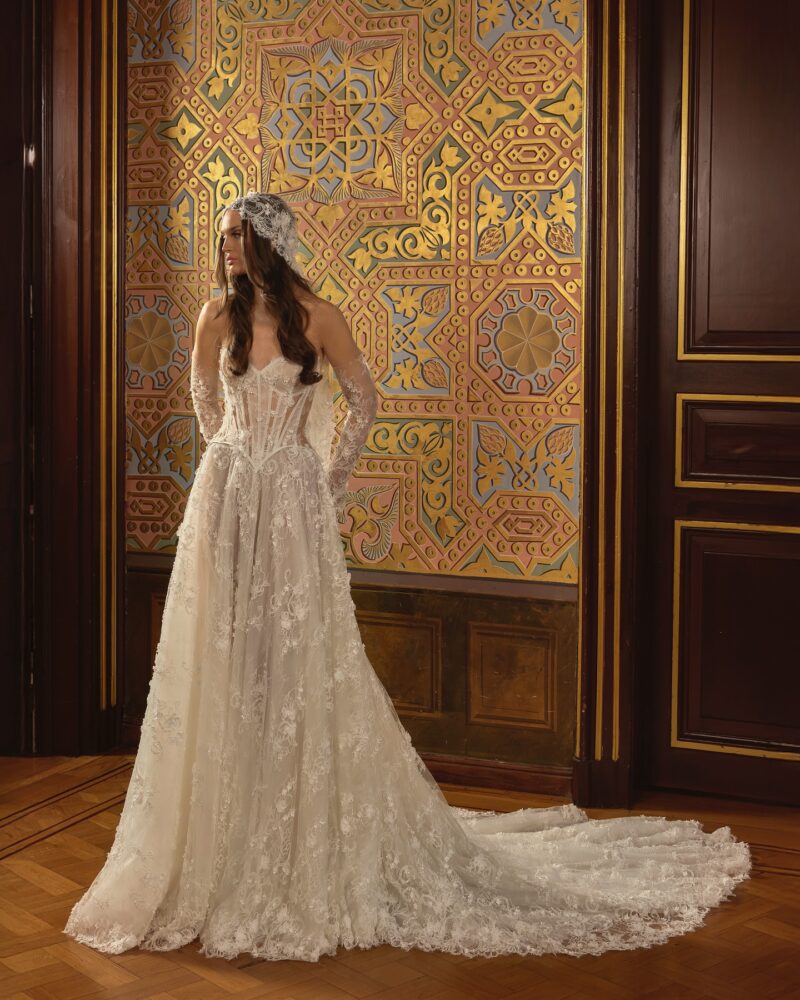 lace ball gown wedding dress with corset bodice and floral lace headpiece