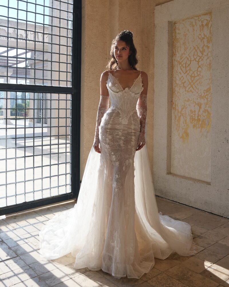 lace mermaid wedding dress with scalloped neckline and fitted silhouette