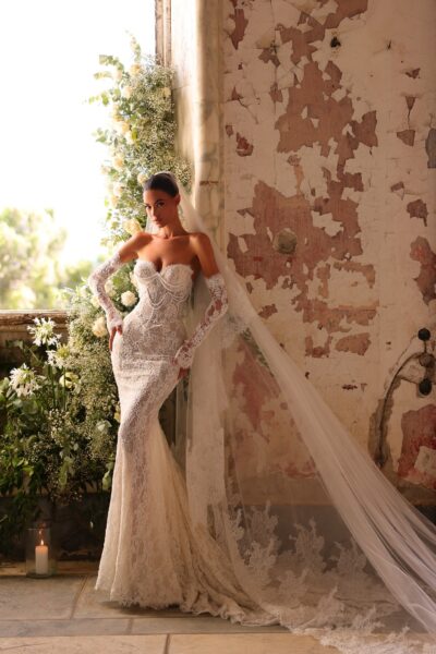 lace mermaid wedding dress with corset bodice and cathedral train