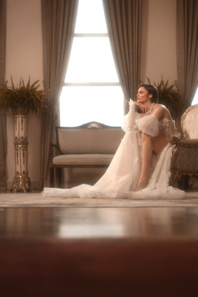 floral lace a-line wedding dress with layered tulle skirt and lace appliqués