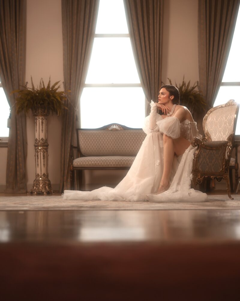 floral lace a-line wedding dress with layered tulle skirt and lace appliqués