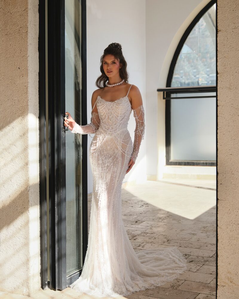 pearl beaded sheath wedding dress with cascading pearl draping