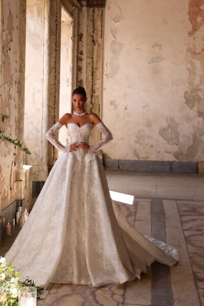 Lace ball gown wedding dress with off-shoulder neckline and long train
